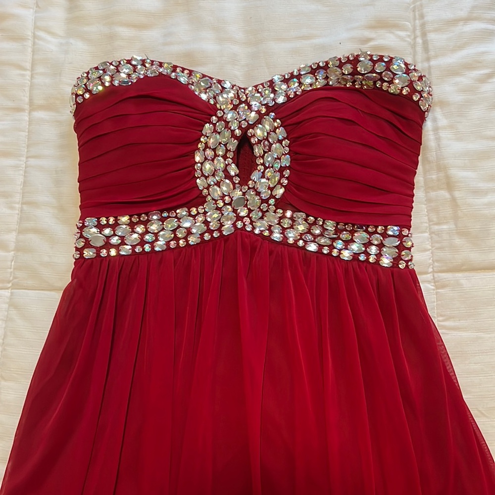 Red strapless jeweled formal dress